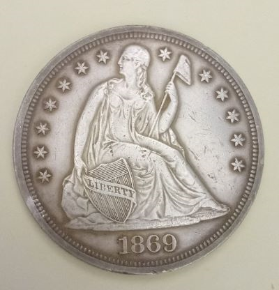 1869-Seated-Dollar-Grades-And-Value?